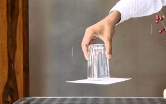 atmospheric pressure experiment with glass of water